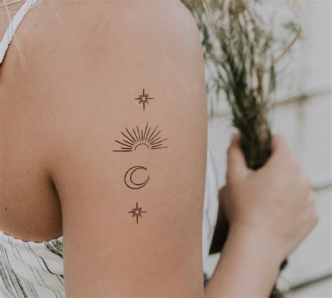 sun on shoulder tattoo 1