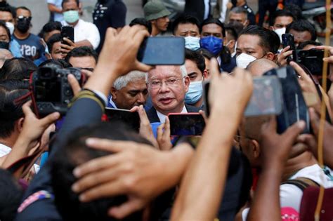 malaysia  pm najib begins  year jail sentence  failing