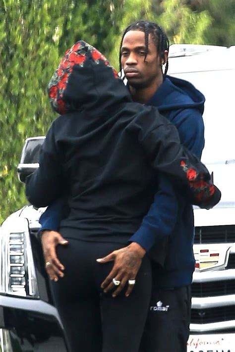 Travis Scott can't keep his hands (or eyes) off Kylie Jenner's bum
