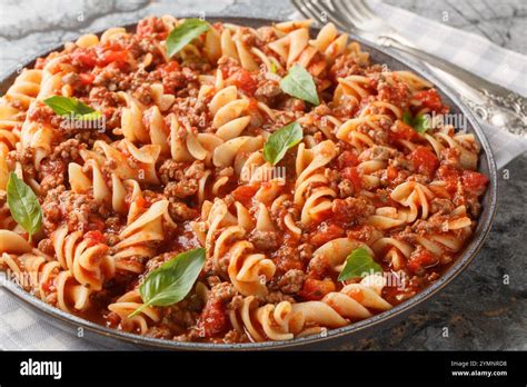 italian fusilloni pasta  ground meat tomato sauce  vegetables