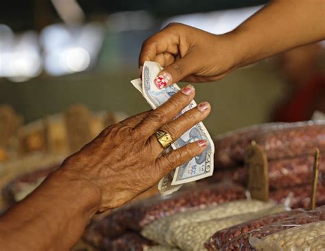 exchange rate unification  cuban case