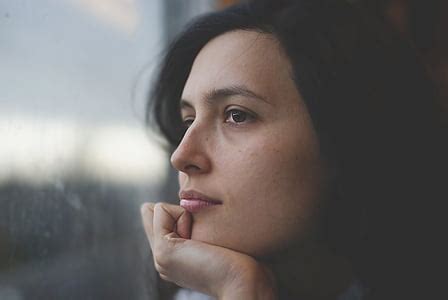 Free photo: worried girl, woman, waiting, sitting, thinking, worry