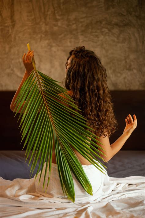 Download Sexy Female Palm Leaf Wallpaper | Wallpapers.com