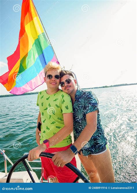Steering Wheel Together, Gay Couple Have a Vacations on a Sailing Yacht