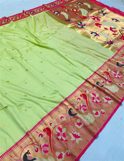 parrot green color paithani silk saree  mina zari border