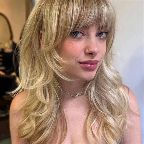 15 Sassy Wavy Wolf Cuts With Bangs | HairAide | Long hair cuts, Long ...