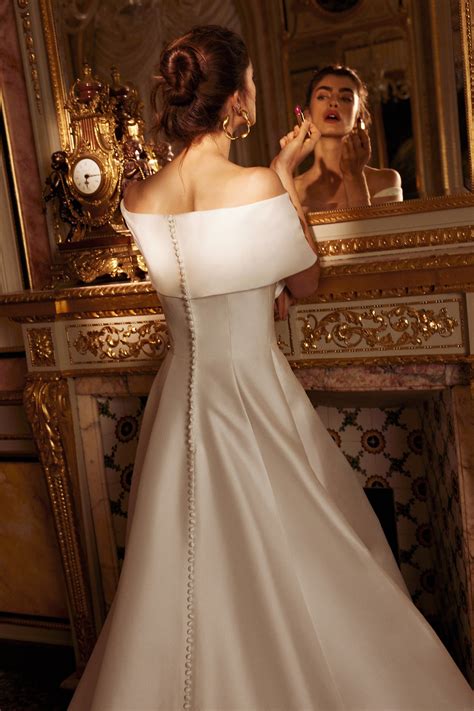 Harper: A-Line Wedding Dress with Off The Shoulder Cuff and Skirt Slit