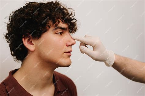 premium photo rhinoplasty consultation  man  plastic surgery