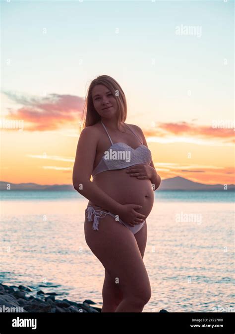 Pregnancy bikini hi-res stock photography and images - Alamy