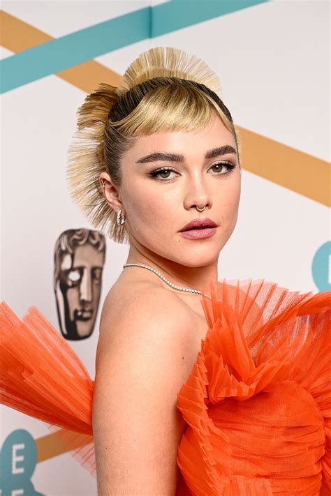 Florence Pugh unveils a chic blonde micro fringe on the BAFTA 2023 red