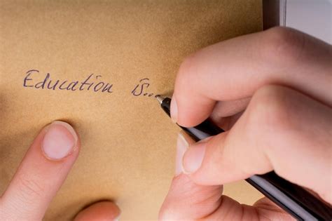 premium photo hand writing education    notebook