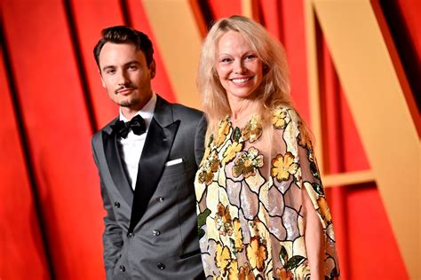 Pamela Anderson poses makeup-free with son Brandon at 2024 Vanity Fair