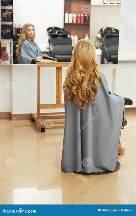 Blonde Hair. Woman in Hair Salon Stock Photo - Image of long, blond ...