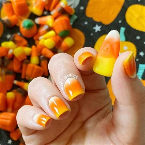 21 Cute Halloween Candy Corn Nails - Finance Stallion