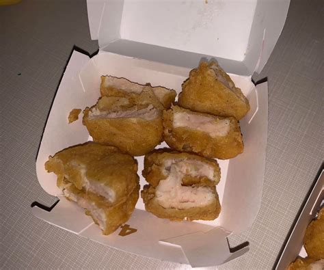 Woman claims she got sick after eating raw McDonald's chicken nuggets
