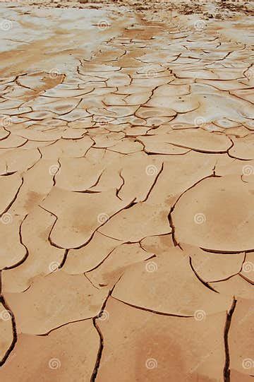 scene   desolate desert landscape   cracked earth surface stock