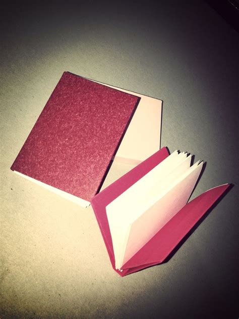 How to Make an Origami Book | Book origami, Handmade books, Origami