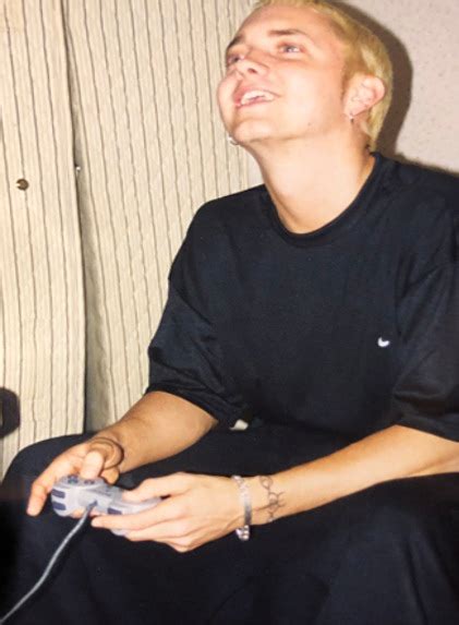 Eminem playing PlayStation : r/Eminem