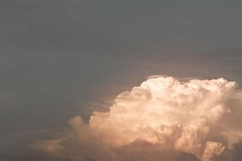 Premium Photo | Gold sunset sky cumulus cloud closeup before sunset white cloud with evening ...