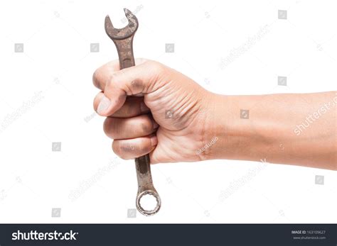 hand holding spanner isolated  white stock photo  shutterstock