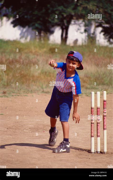 Indian child boy playing cricket bowling ; India ; asia ; MR#158 Stock ...