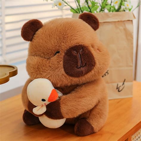DJKDJL 11.81" Capybara Stuffed Animal Plush Toys, Capybara Holding Duck