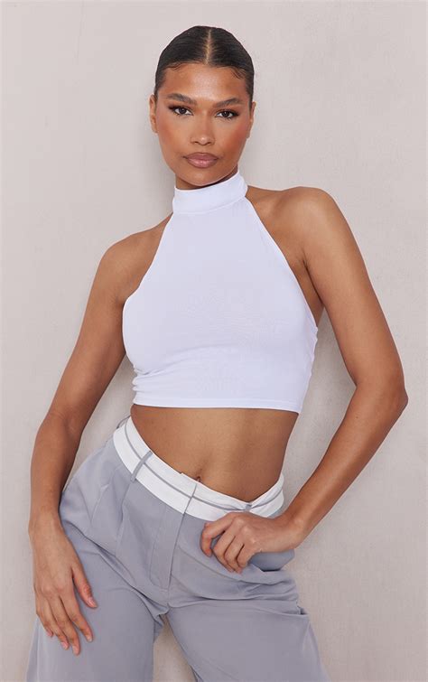 White Cotton High Neck Halter Crop Top | Tops | PrettyLittleThing