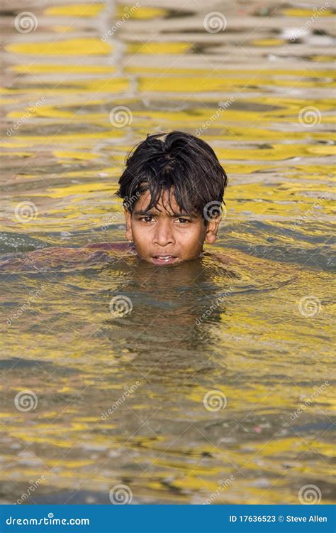 Boy Swimming in the Holy River Ganges - India. Editorial Stock Photo ...