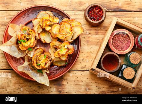 Baked potatoes in bacon Stock Photo - Alamy