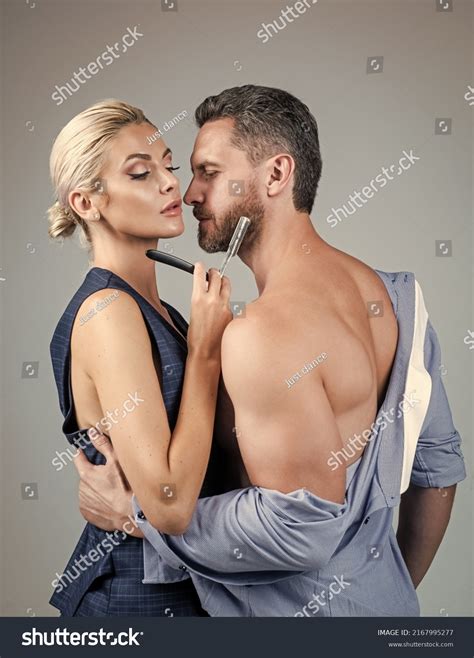 Sensual Undressed Couple Naked Woman Shaving Foto stock 2167995277