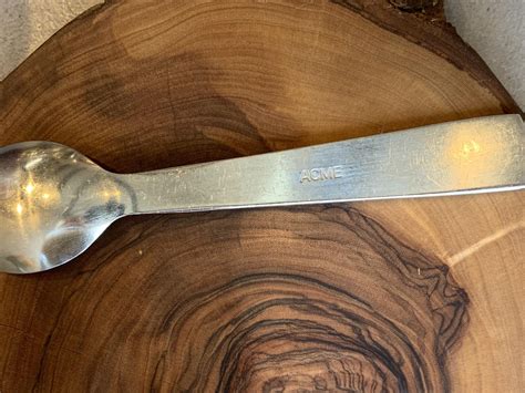 This spoon stamped ACME : r/mildlyinteresting