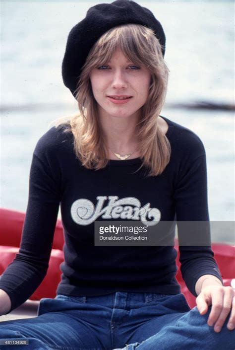 Portrait of musician Nancy Wilson of the rock group Heart looking