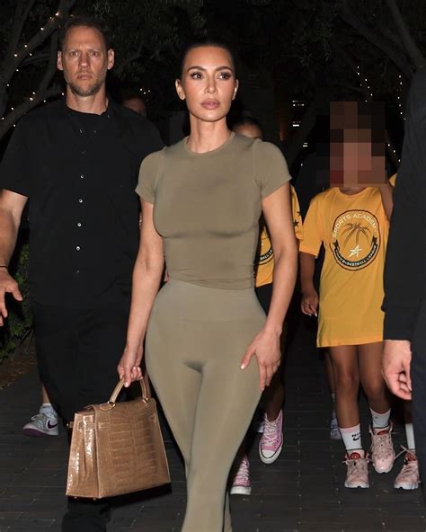 Kim Kardashian shows off her real curves in skintight leggings and top