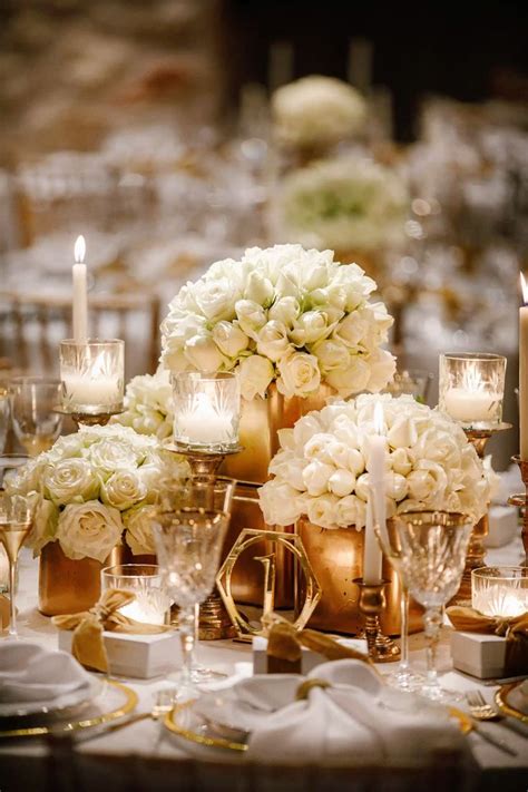 white flowers  gold accents white  gold flower centerpieces