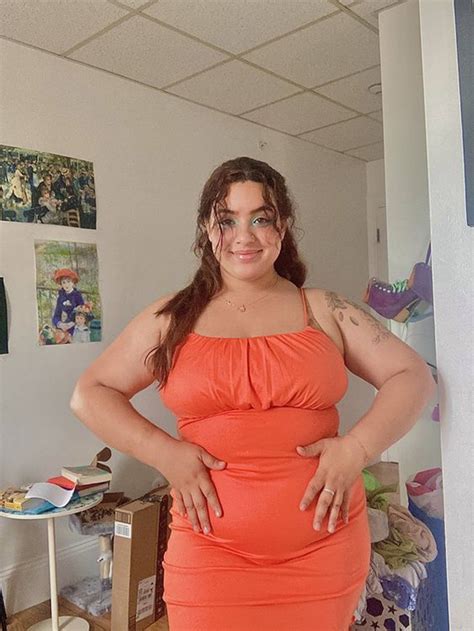 Download A charming chubby teen girl in a colorful orange dress
