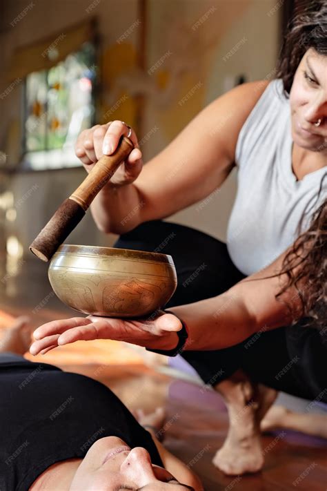 Premium Photo | Female latin yoga teacher conducting a meditation