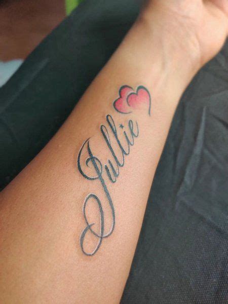 Heart Tattoos With Names | Heart tattoos with names, Forearm name ...