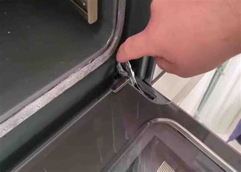 how to clean between the glass on oven door