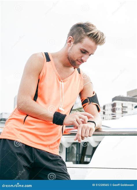 Using Wearable Fitness Gear Stock Image - Image of jogger, energy: 51228565