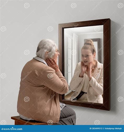Creative Conceptual College. Senior Woman Looking in Mirror with