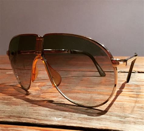 “Scarface’s Tony Montana” Porsche Design by carrera light golden just ...