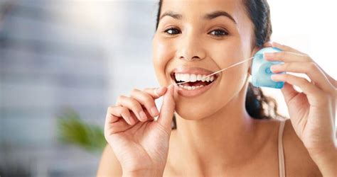 properly floss  teeth trio dental center