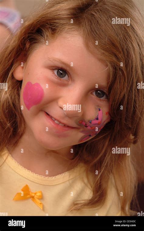 Portrait of a little girl with face paint Stock Photo - Alamy