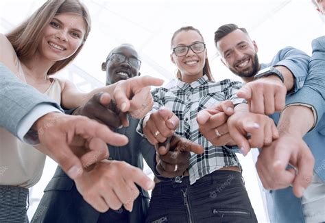 premium photo business people pointing   camera isolated  white
