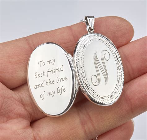 large engraved oval sterling silver locket  photoetched decorative