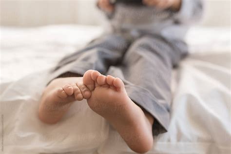 "Little Boys Feet" by Stocksy Contributor "Alison Winterroth" - Stocksy