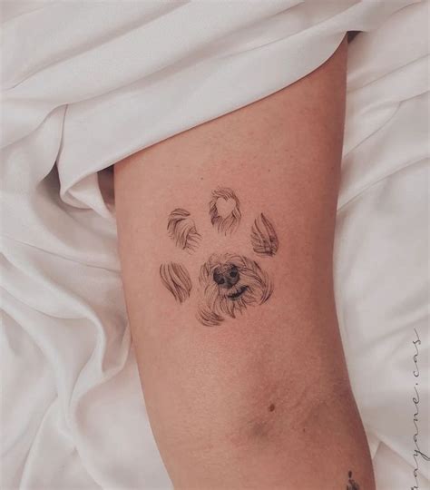 Tatuagem Patas De Cao - Tatuagem pata de cachorro | Tatuagem de patinha, Tatuagem cao, Tatoo
