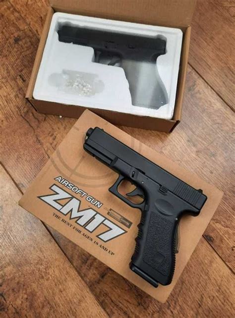 Металевий пистолет новий на кульках пластик іграшковий zm 17 глок 6мм ...