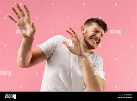 I'm afraid. Fright. Portrait of the scared man. Business man standing ...