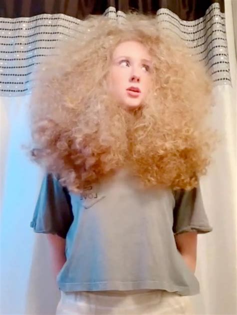 Woman shocks TikTok after brushing out natural curls - Daily Star
